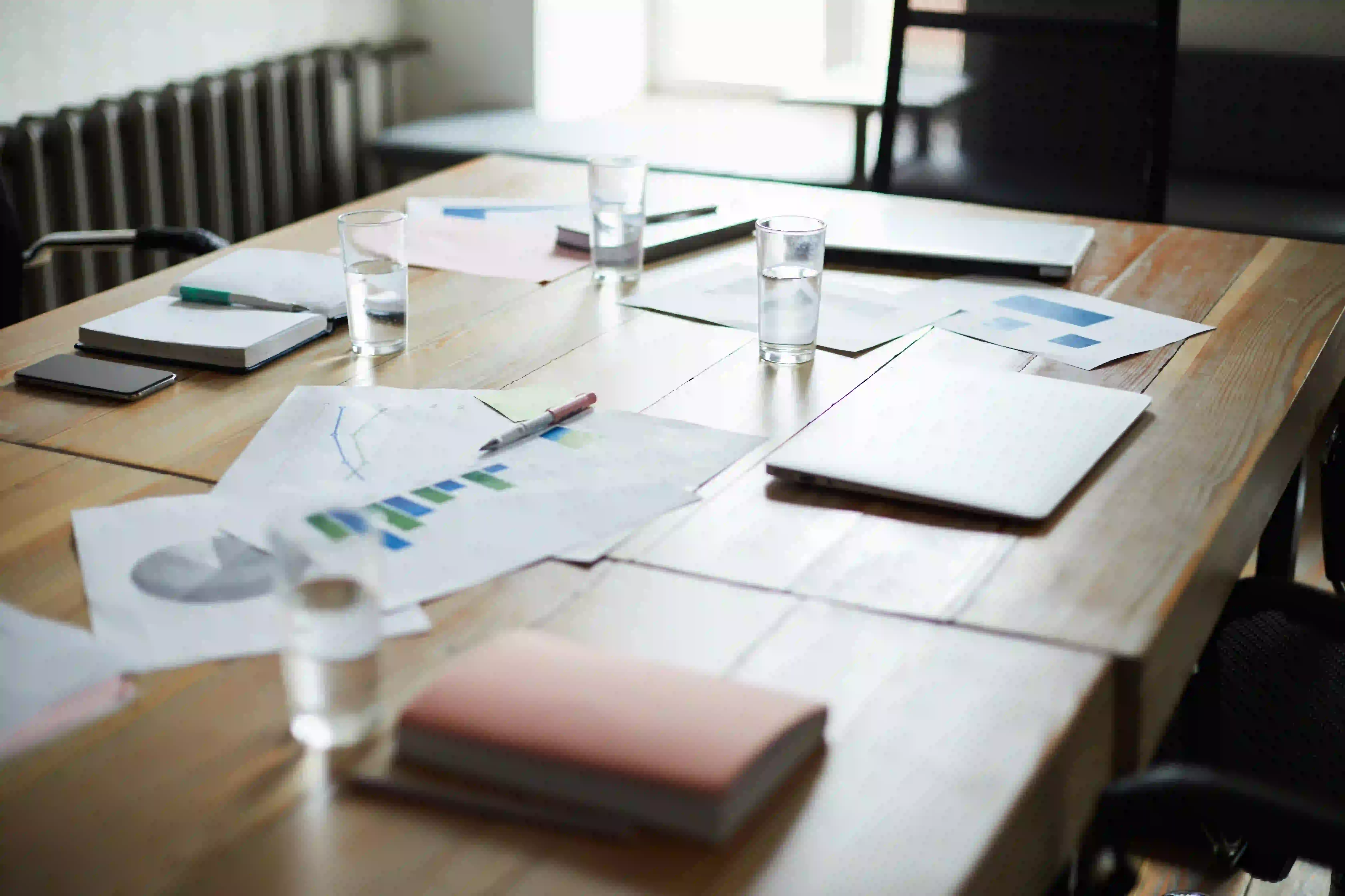 meeting-table-in-shadows-2026-01-09-01-07-27-utc.webp (2)